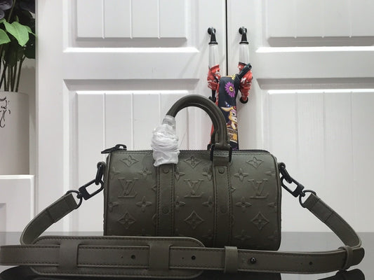 Mini Olive Leather Barrel Cross body Bag